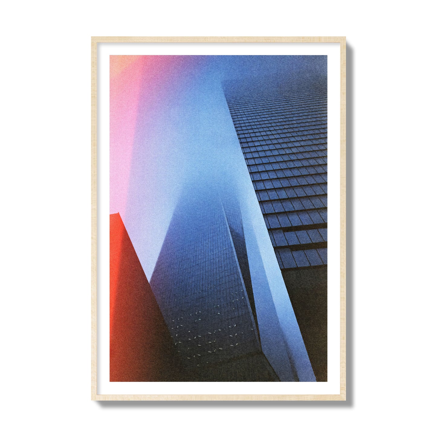 Fine art street photograph of the World Trade Center highlighting geometric shapes, with a dreamlike, cinematic feel in predominantly blue and red hues, archival pigment print, collector size, natural wood frame.