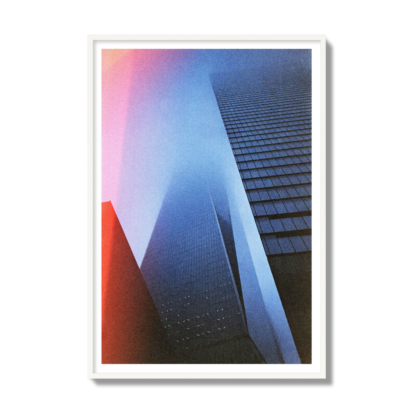 Fine art street photograph of the World Trade Center highlighting geometric shapes, with a dreamlike, cinematic feel in predominantly blue and red hues, archival pigment print, gallery size, white frame.