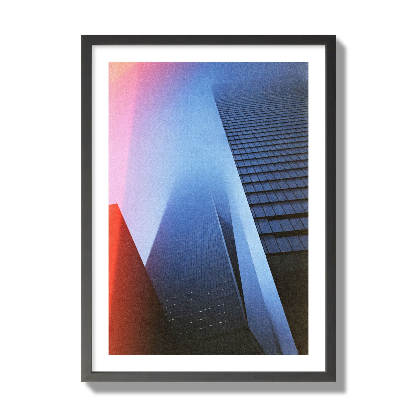 Fine art street photograph of the World Trade Center highlighting geometric shapes, with a dreamlike, cinematic feel in predominantly blue and red hues, archival pigment print, giant size, black frame.