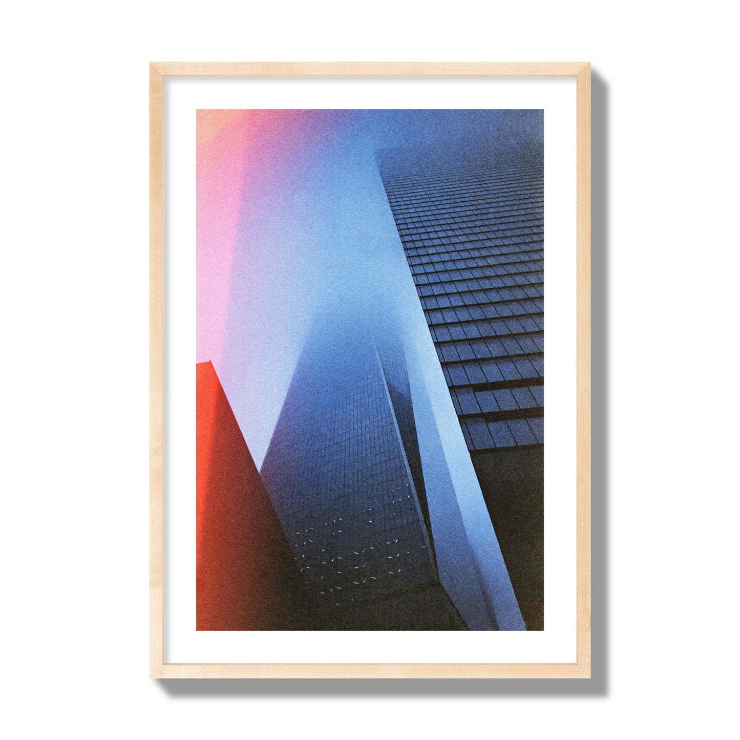 Fine art street photograph of the World Trade Center highlighting geometric shapes, with a dreamlike, cinematic feel in predominantly blue and red hues, archival pigment print, giant size, natural wood frame.