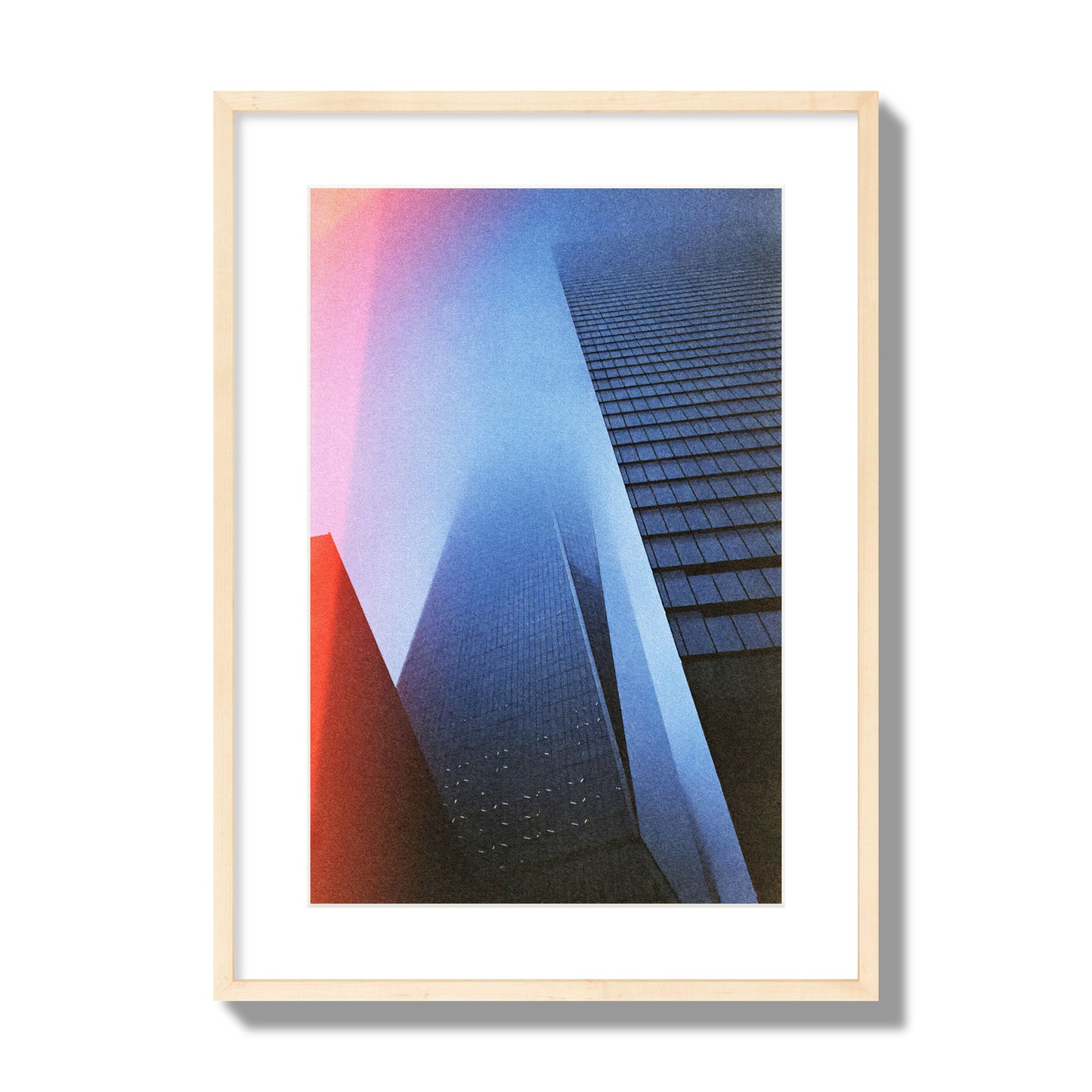 Fine art street photograph of the World Trade Center highlighting geometric shapes, with a dreamlike, cinematic feel in predominantly blue and red hues, archival pigment print, large size, natural wood frame.