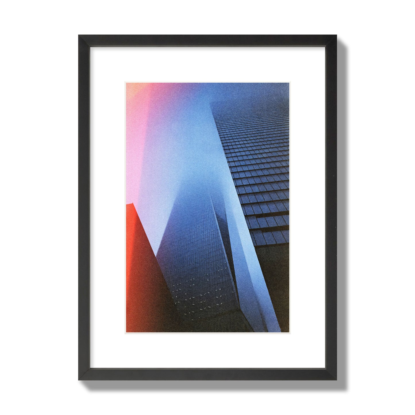 Fine art street photograph of the World Trade Center highlighting geometric shapes, with a dreamlike, cinematic feel in predominantly blue and red hues, archival pigment print, medium size, black frame.