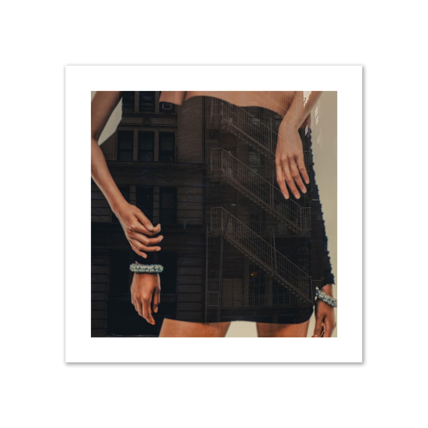 Fine art photograph of two women in black dresses, with the pattern of a fire escape reflected across the fabric, archival pigment print, collector size, print.