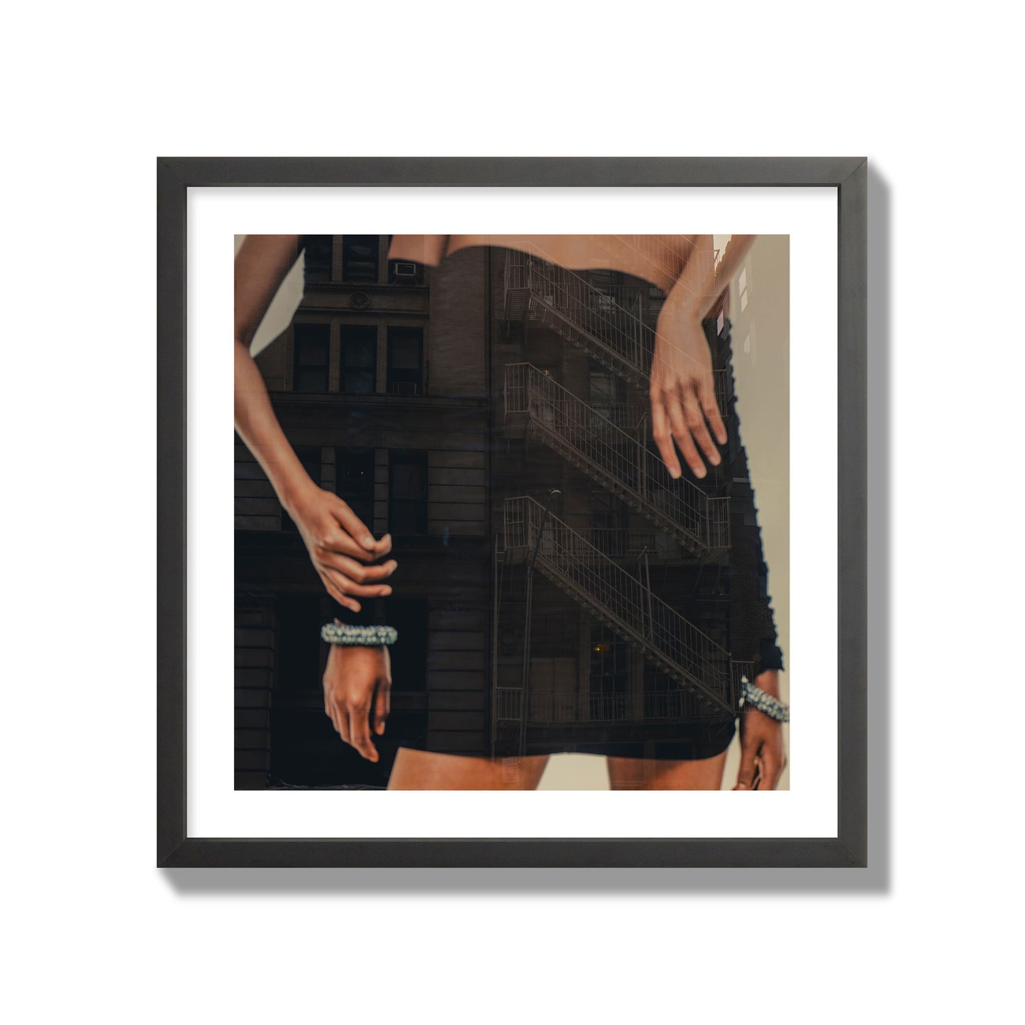 Fine art photograph of two women in black dresses, with the pattern of a fire escape reflected across the fabric, archival pigment print, giant size, black frame.