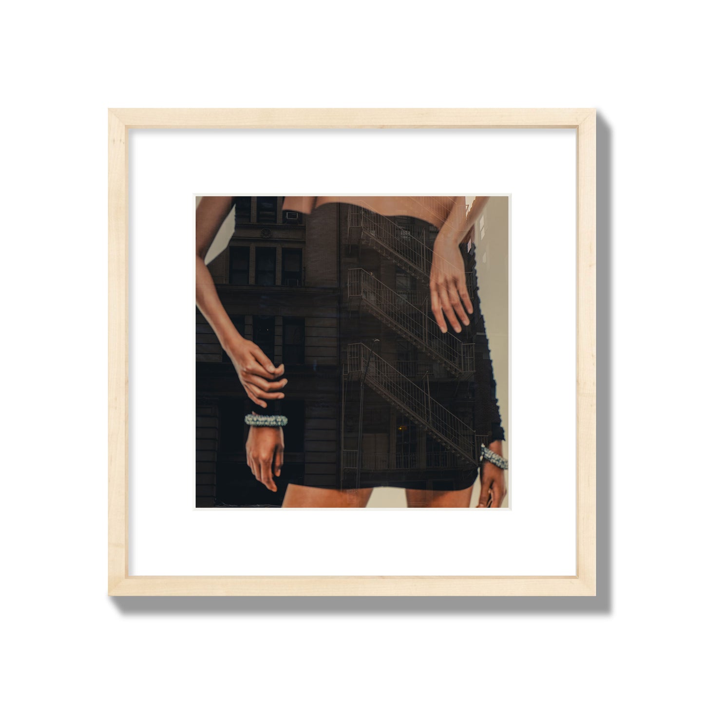 Fine art photograph of two women in black dresses, with the pattern of a fire escape reflected across the fabric, archival pigment print, medium size, natural frame.