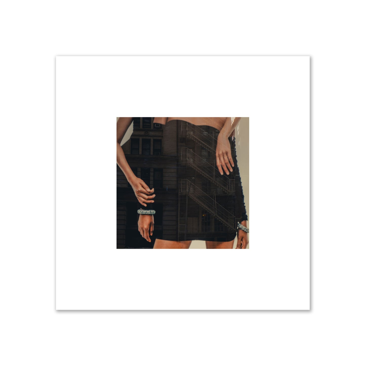 Fine art photograph of two women in black dresses, with the pattern of a fire escape reflected across the fabric, archival pigment print, small size, print.