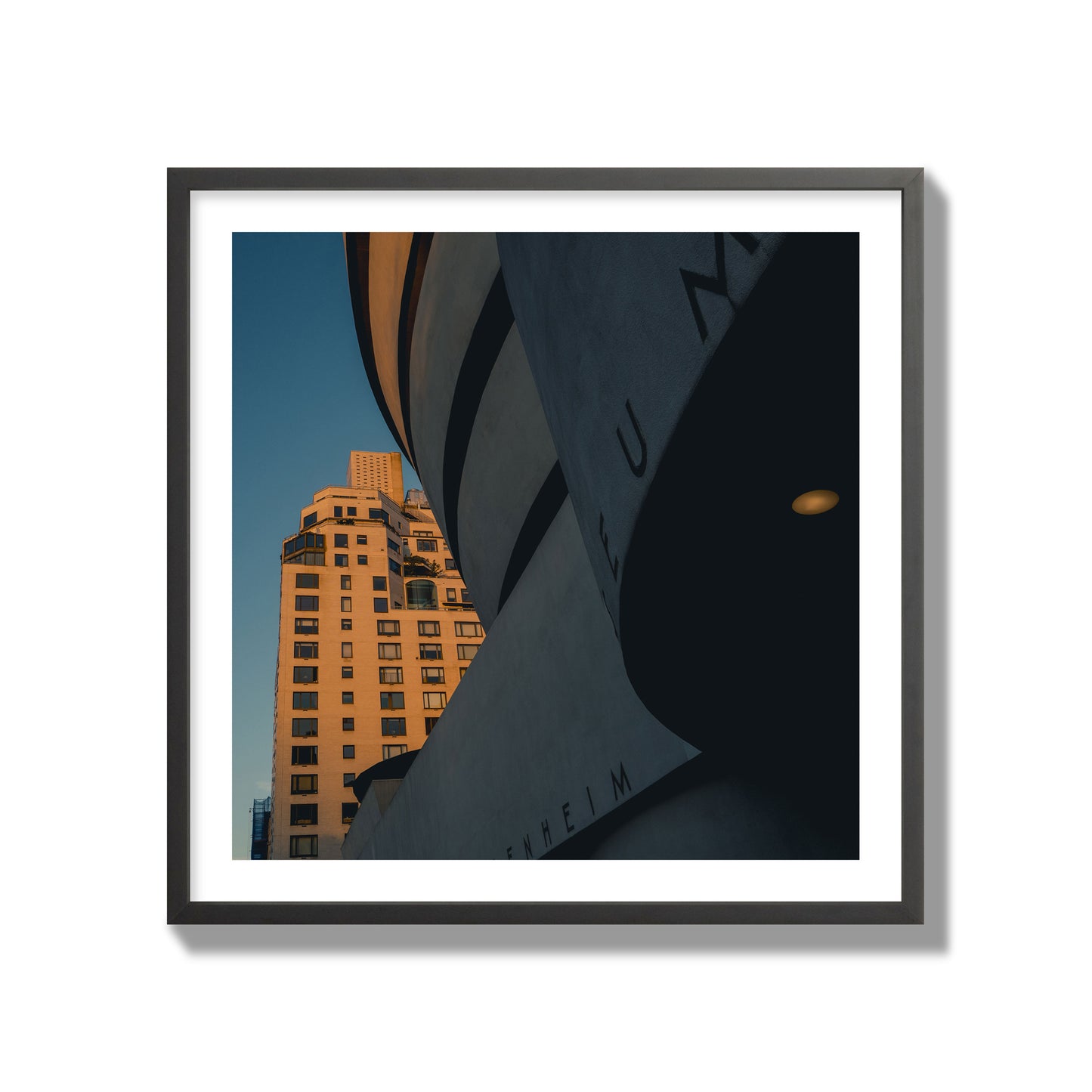 Fine art photograph of the Guggenheim Museum at dusk, archival pigment print, collector size, black frame.