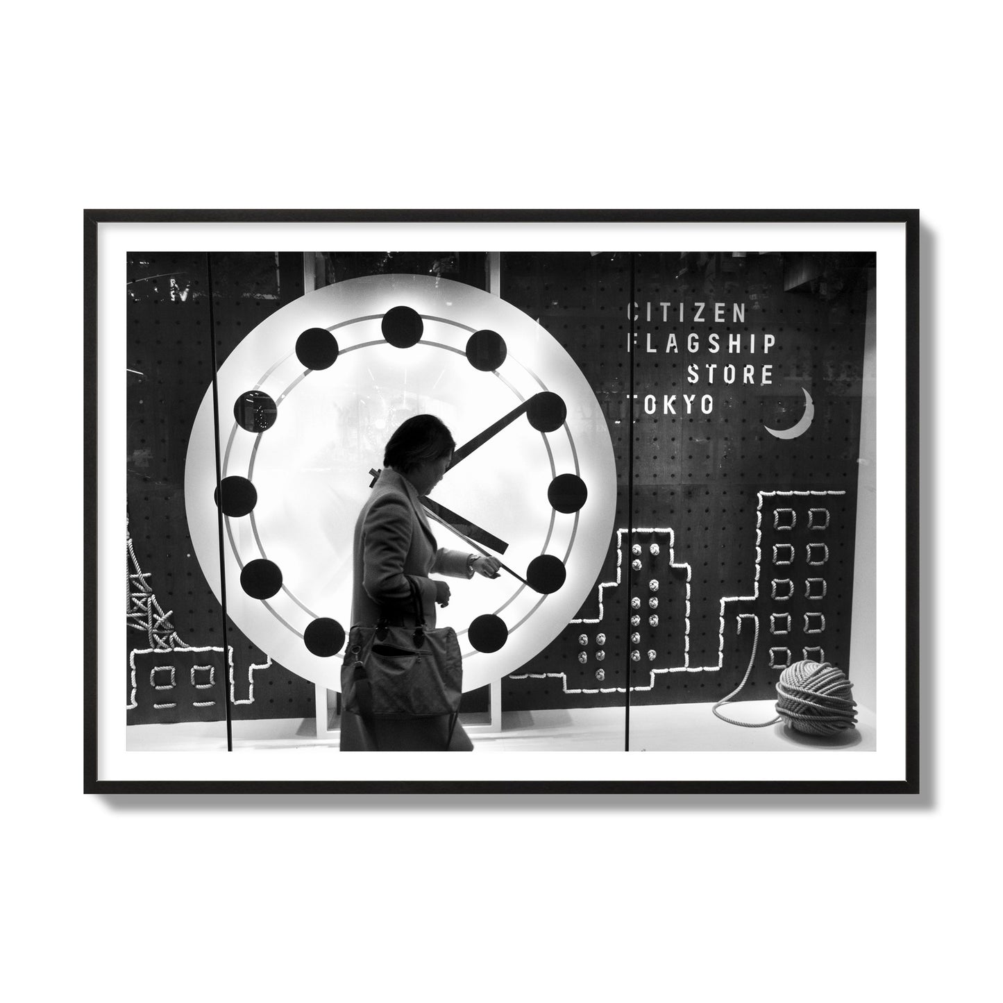 Fine art street photograph of a woman checking her watch as she walks past a giant clock on a busy Tokyo city street. Archival pigment print, collector size, black frame.