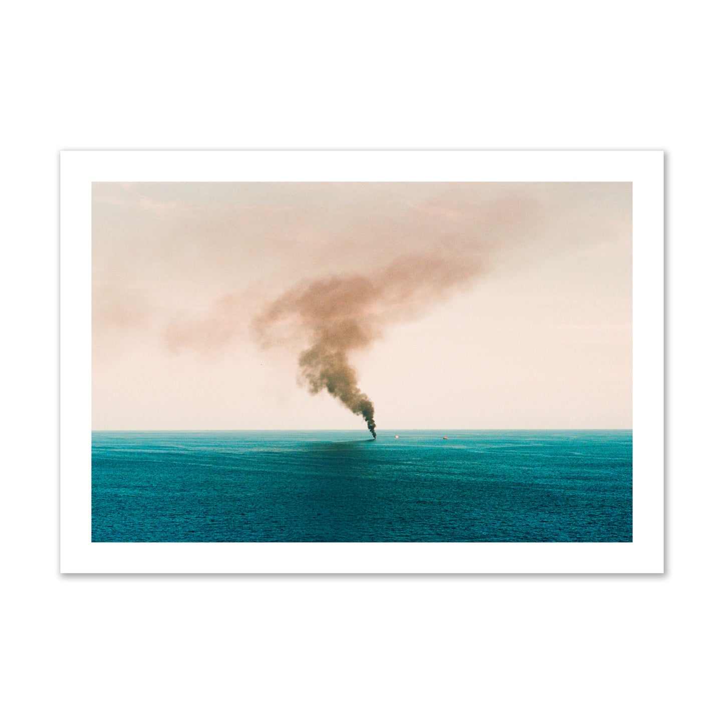 Fine art street photograph of a moody seascape with smoke rising from a distant boat, capturing a sense of mystery and atmosphere. Archival pigment print, collector size, unframed.