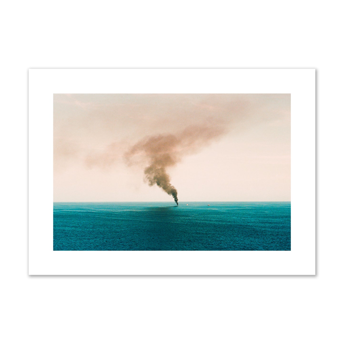 Fine art street photograph of a moody seascape with smoke rising from a distant boat, capturing a sense of mystery and atmosphere. Archival pigment print, giant size, unframed.