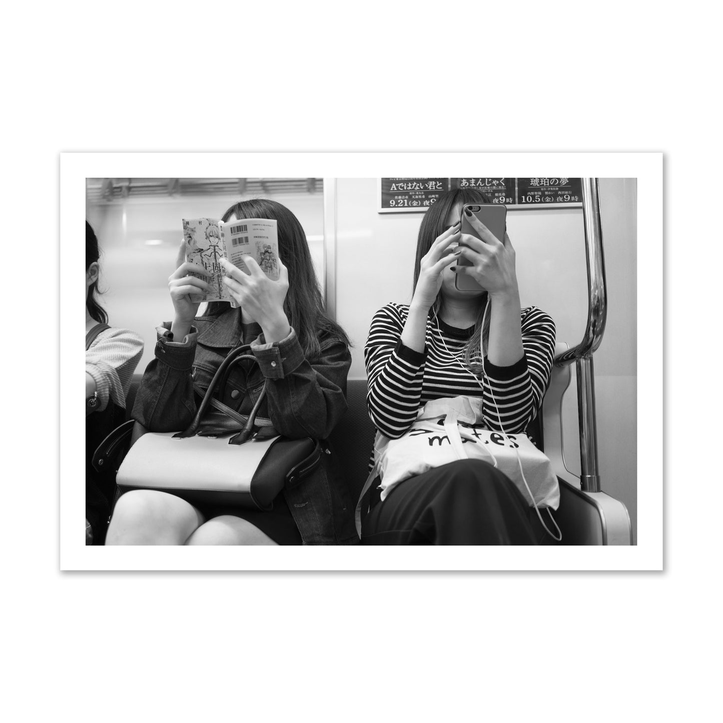 Black and white fine art photograph of two women on the Tokyo Metro, archival pigment print, gallery size, unframed