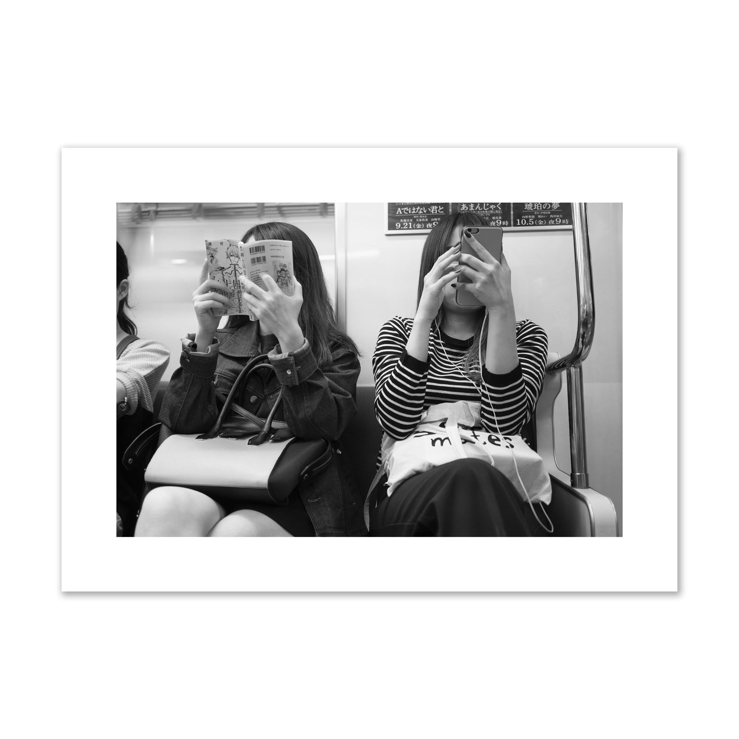 Black and white fine art photograph of two women on the Tokyo Metro, archival pigment print, large size, unframed
