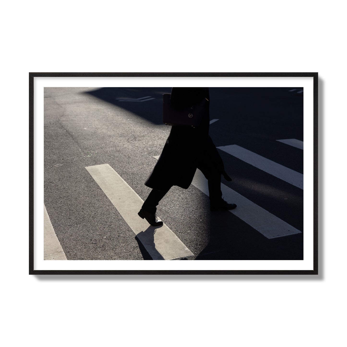 Fine art street photograph of a woman walking through a crosswalk in Soho New York, archival pigment print, collector size, black frame