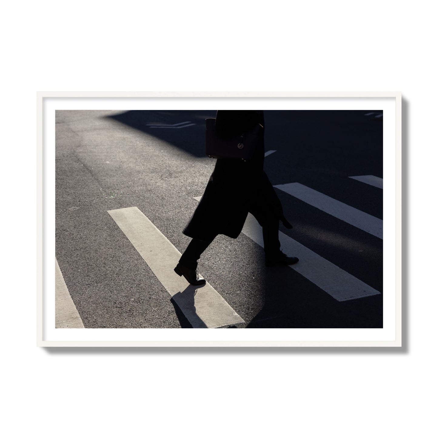 Fine art street photograph of a woman walking through a crosswalk in Soho New York, archival pigment print, collector size, white frame