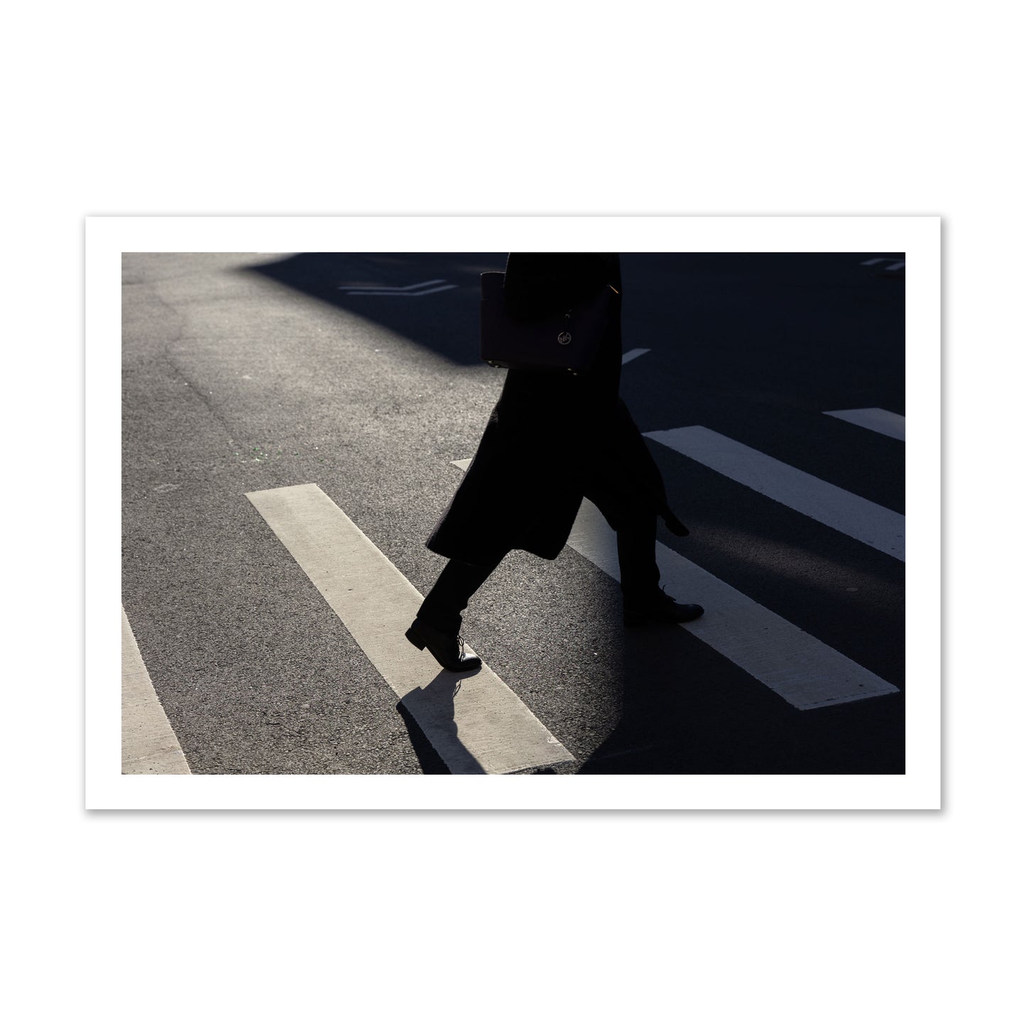 Fine art street photograph of a woman walking through a crosswalk in Soho New York, archival pigment print, gallery size, unframed