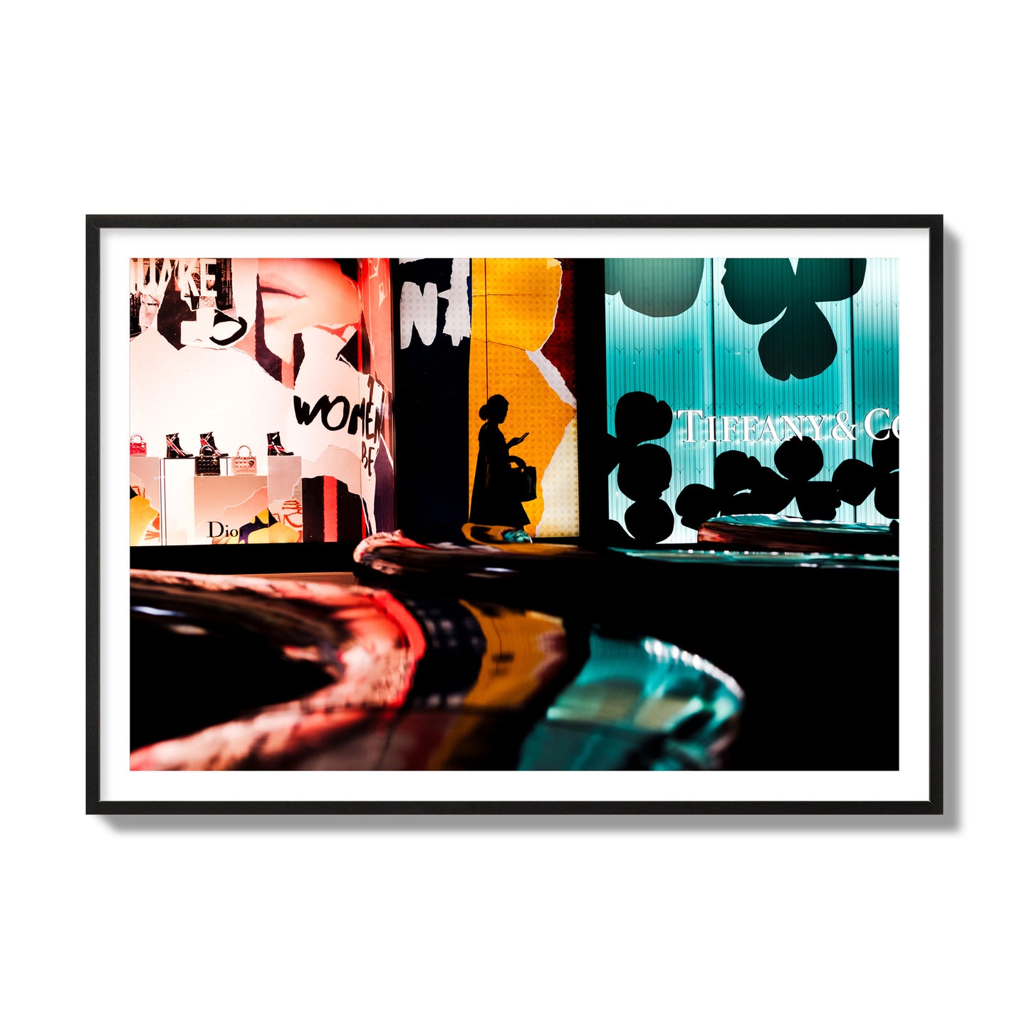Fine art photograph of a woman’s silhouette walking past vibrant neon store signs, archival pigment print, collector size, black frame.
