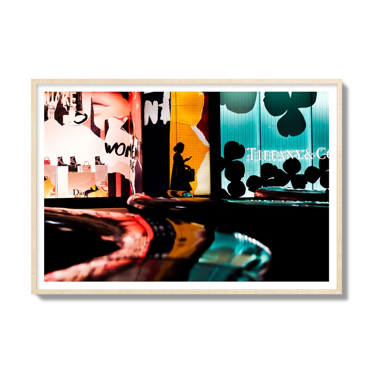 Fine art photograph of a woman’s silhouette walking past vibrant neon store signs, archival pigment print, gallery size, natural wood frame.