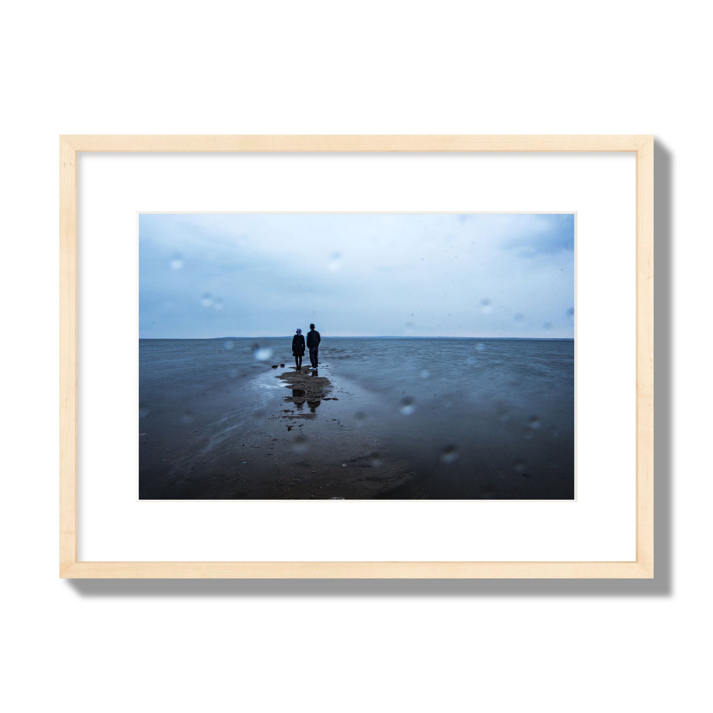 Fine Art Landscape Photography of a Couple Gazing Into the Ocean, archival pigment print, medium size, natural wood frame.