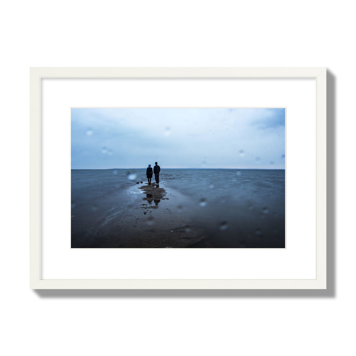Fine Art Landscape Photography of a Couple Gazing Into the Ocean, archival pigment print, medium size, white frame.