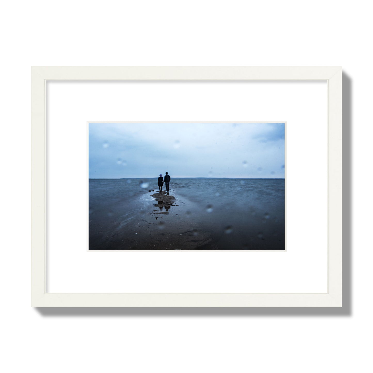 Fine Art Landscape Photography of a Couple Gazing Into the Ocean, archival pigment print, small size, white frame.