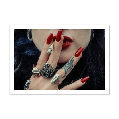 Fine art close-up photograph of a woman smoking, her hands covered with chunky rings and tattoos. Archival pigment print, gallery size, print.