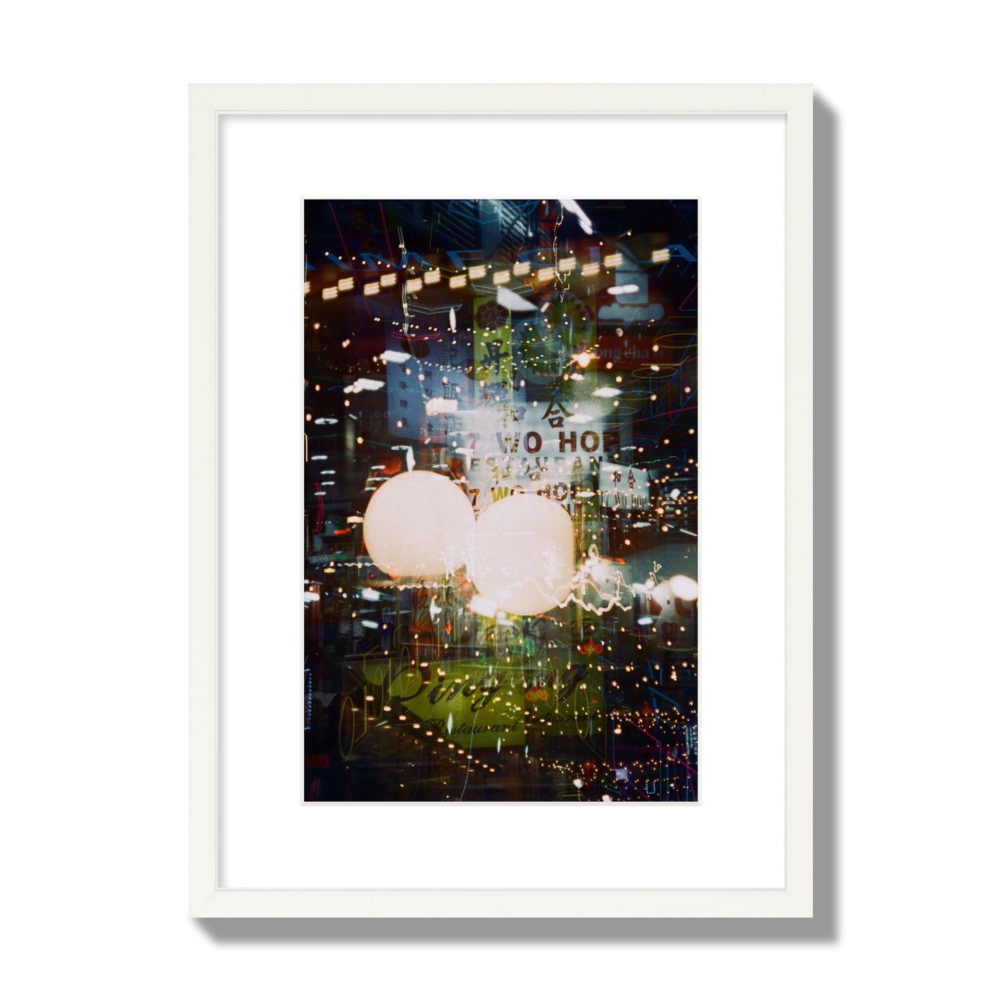 Fine art street photograph of a multiple exposure capture of Chinatown in NYC, archival pigment print, medium size, white frame.