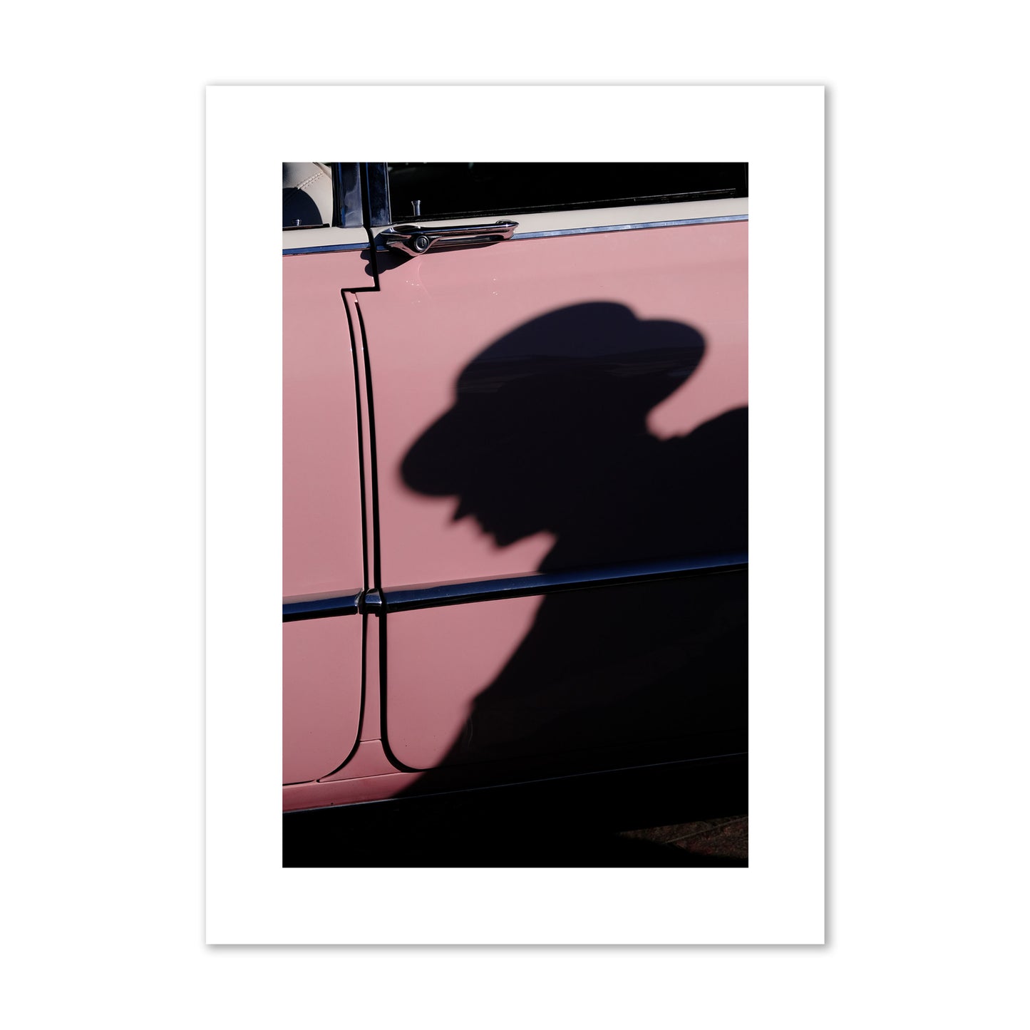 Fine art photograph of a man's shadow cast on a pink retro car, archival pigment print, large size, print.
