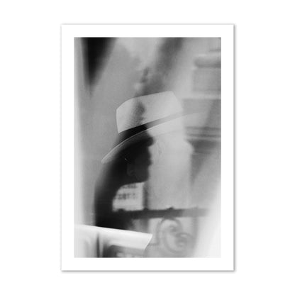 Fine art black and white photograph of multiple faces reflecting in a window, archival pigment print, collector size, print.