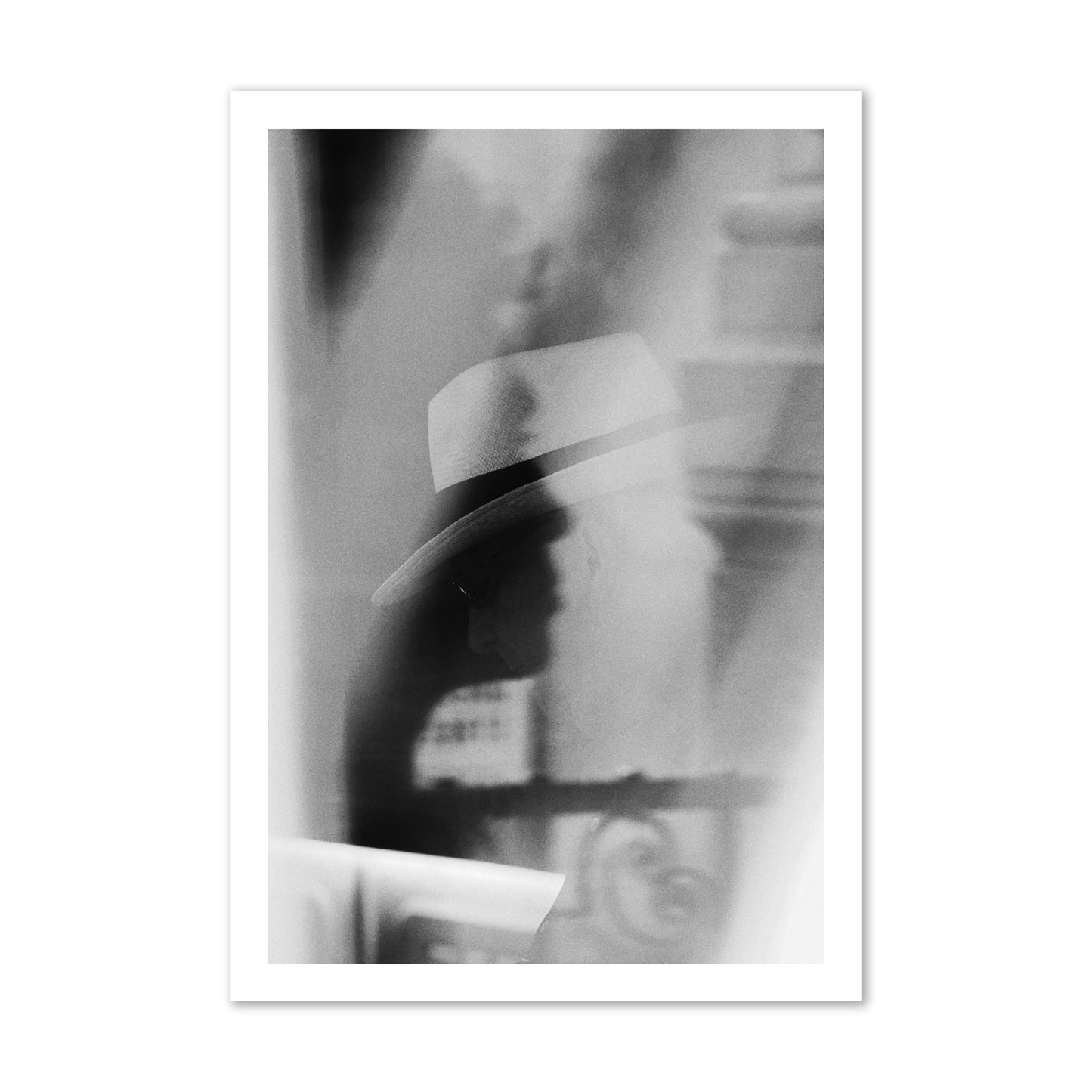 Fine art black and white photograph of multiple faces reflecting in a window, archival pigment print, gallery size, print.