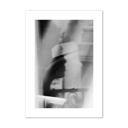 Fine art black and white photograph of multiple faces reflecting in a window, archival pigment print, giant size, print.