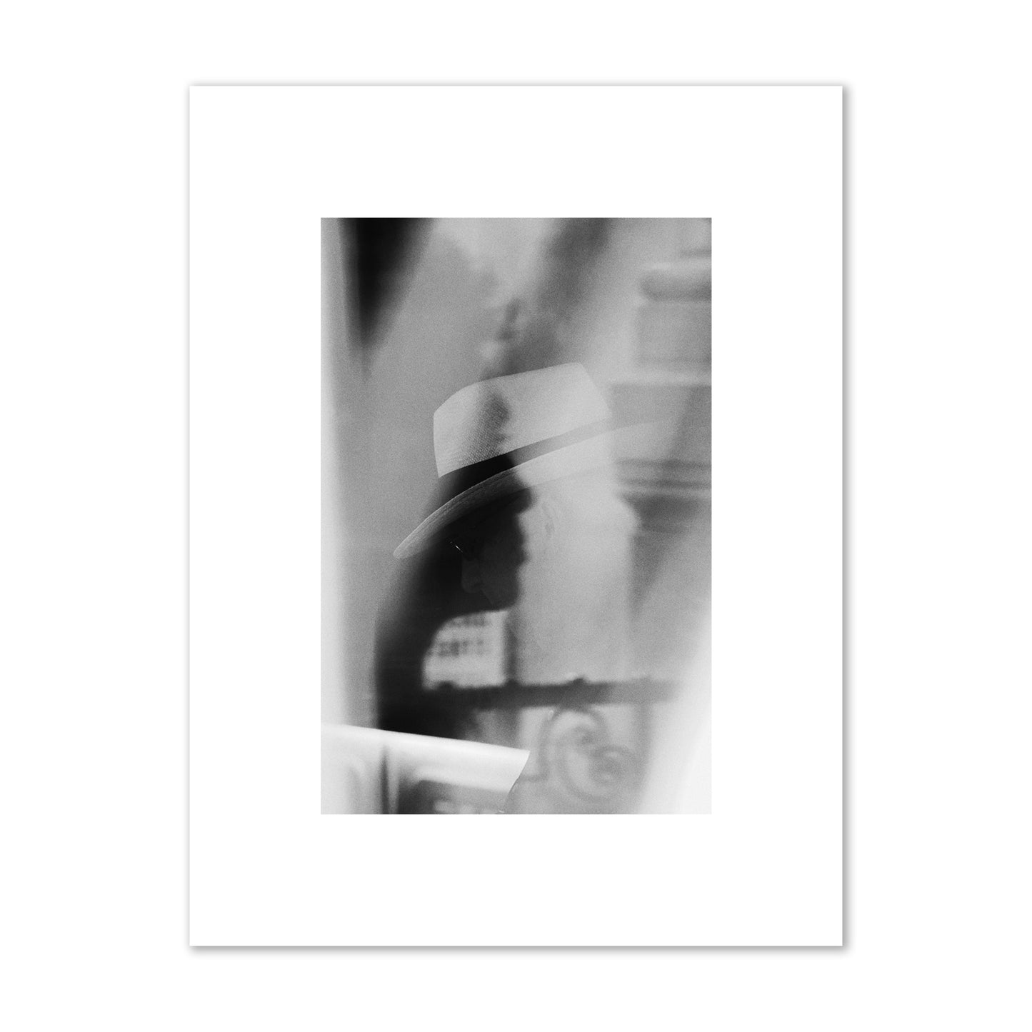 Fine art black and white photograph of multiple faces reflecting in a window, archival pigment print, small size, print.