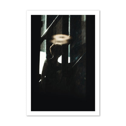 Fine art photograph of a silhouetted woman with a glowing halo light above her head, archival pigment print, gallery size, print.