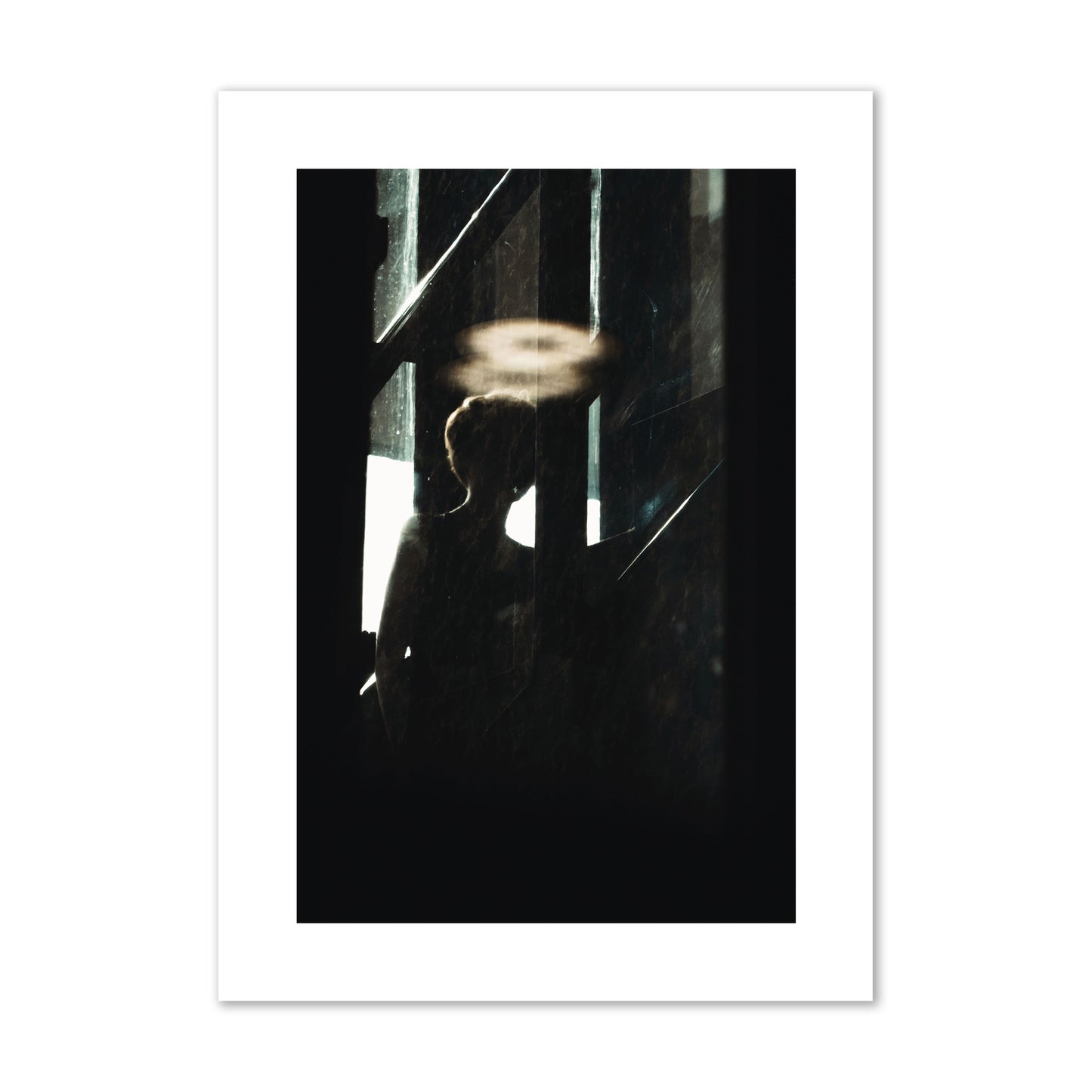 Fine art photograph of a silhouetted woman with a glowing halo light above her head, archival pigment print, giant size, print.
