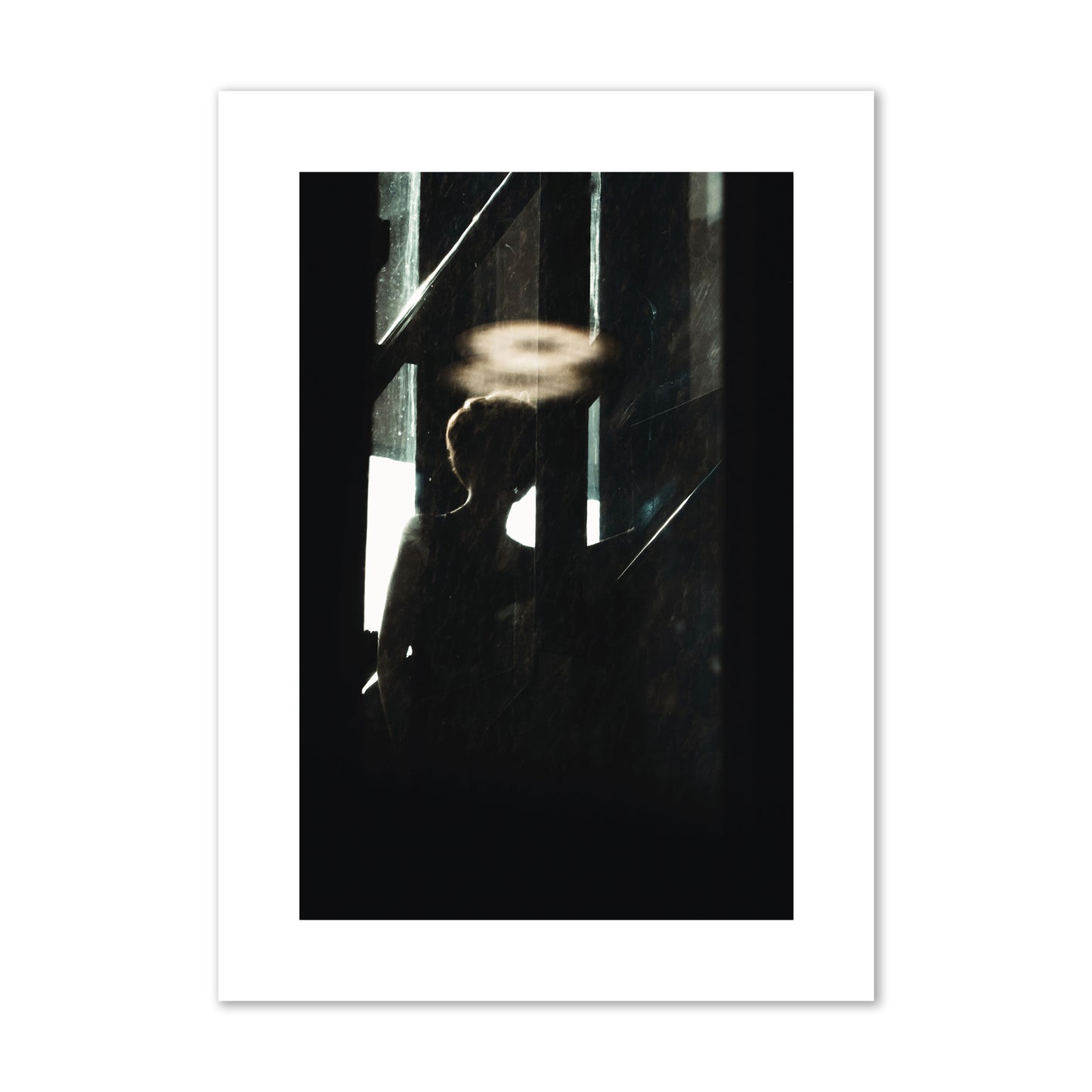 Fine art photograph of a silhouetted woman with a glowing halo light above her head, archival pigment print, large size, print.