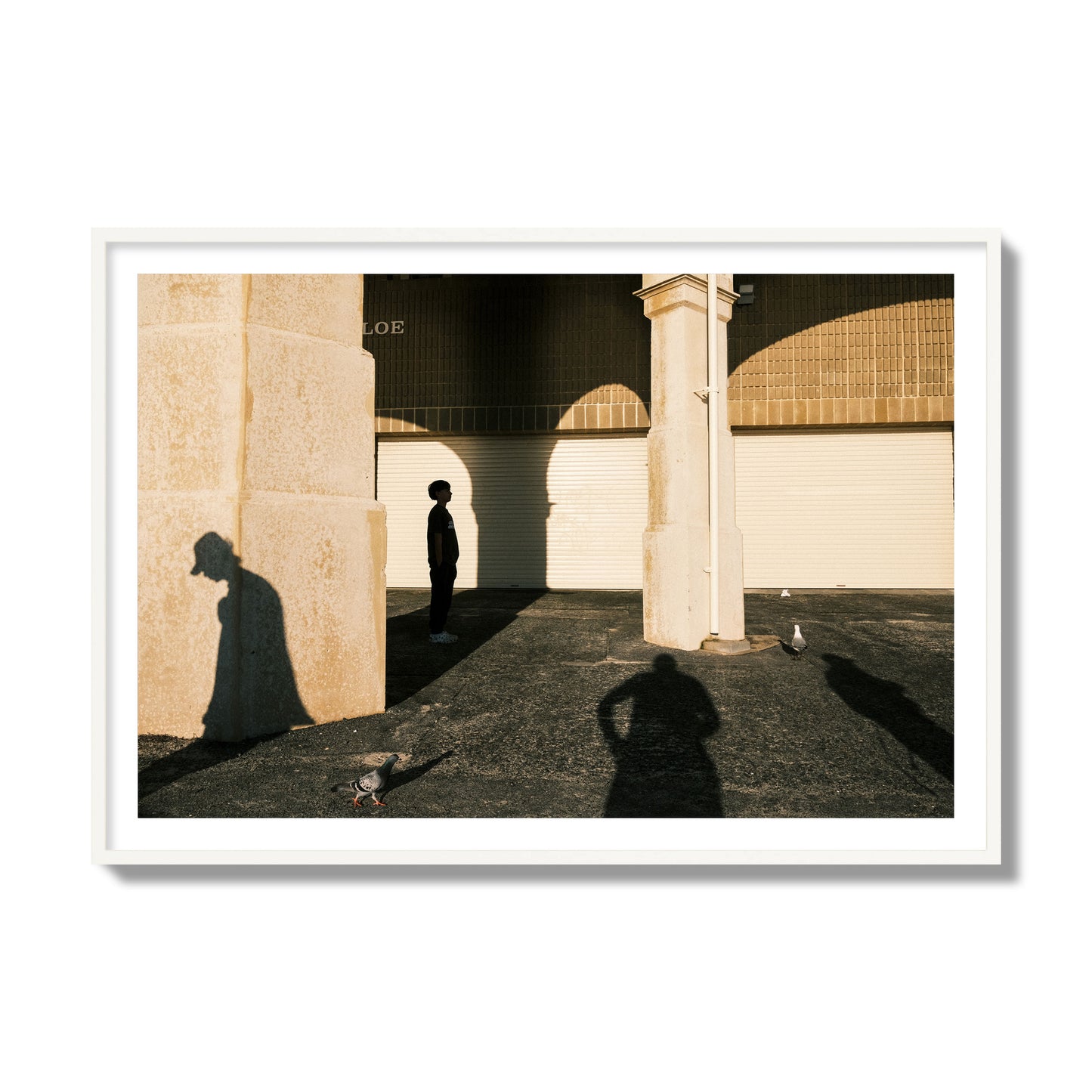Fine art street photograph of shadows cast on the walls of the Indiana Tea House at Cottesloe Perth Western Australia. Archival pigment print, collector size, white frame.