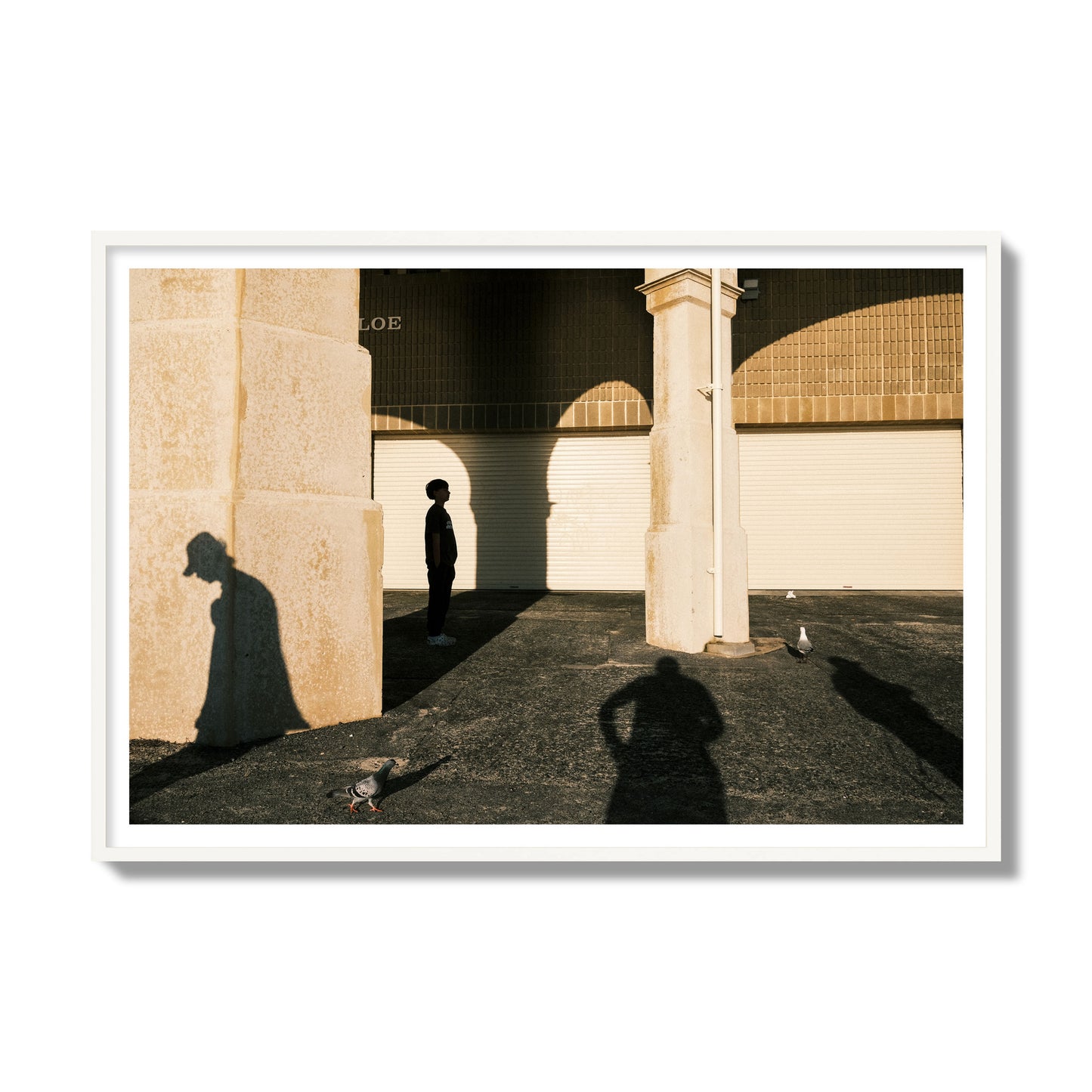 Fine art street photograph of shadows cast on the walls of the Indiana Tea House at Cottesloe Perth Western Australia. Archival pigment print, gallery size, white frame.