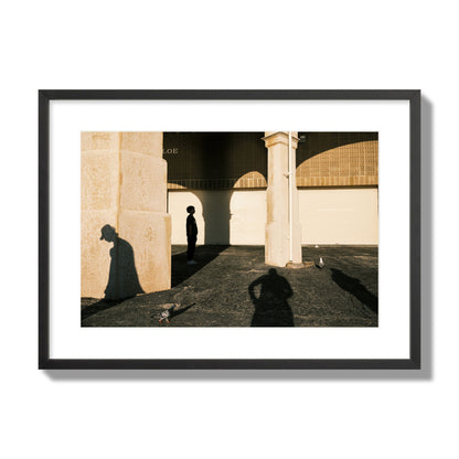 Fine art street photograph of shadows cast on the walls of the Indiana Tea House at Cottesloe Perth Western Australia. Archival pigment print, large size, black frame.