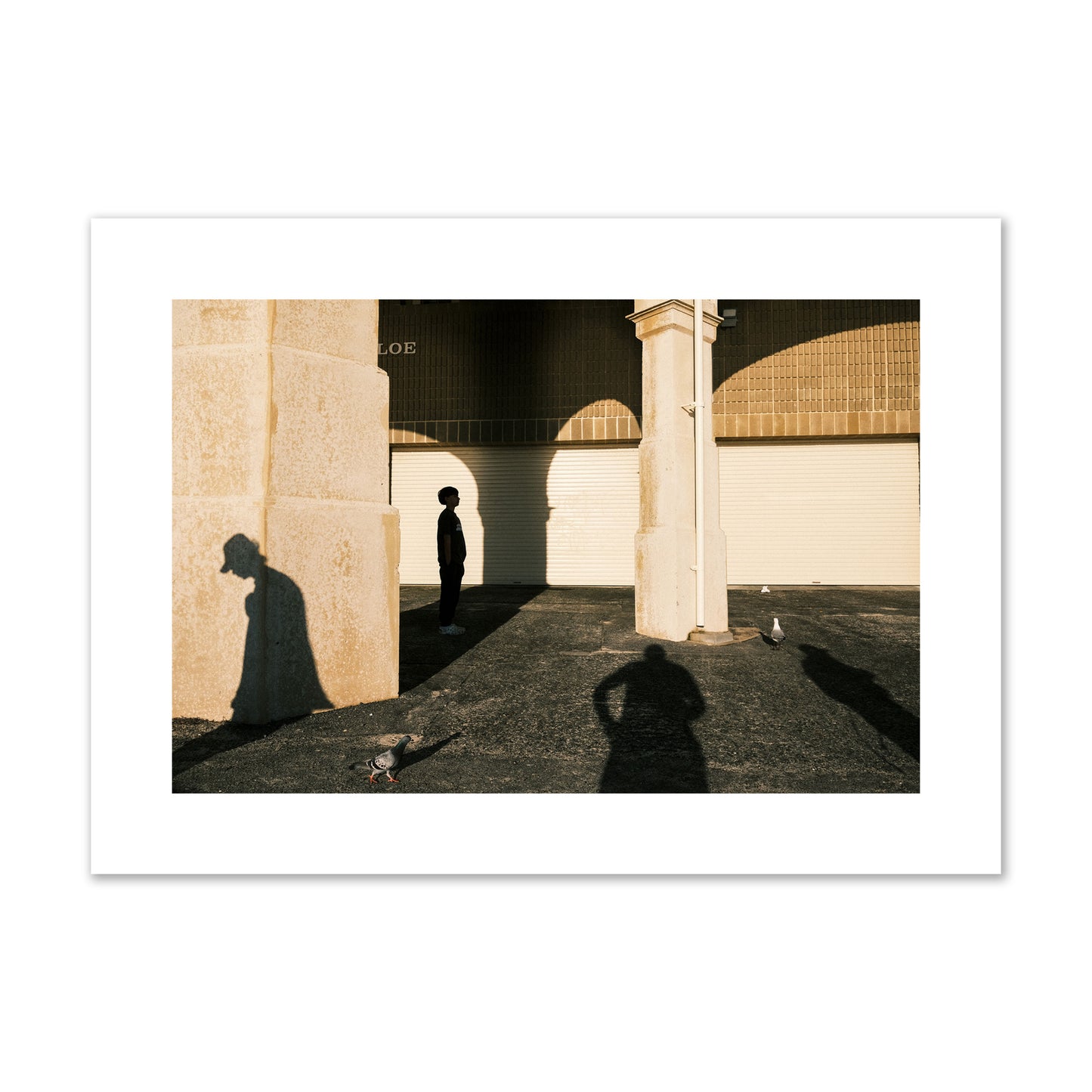 Fine art street photograph of shadows cast on the walls of the Indiana Tea House at Cottesloe Perth Western Australia. Archival pigment print, large size, print.