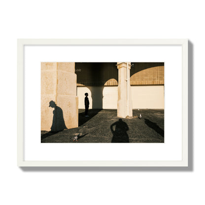 Fine art street photograph of shadows cast on the walls of the Indiana Tea House at Cottesloe Perth Western Australia. Archival pigment print, medium size, white frame.