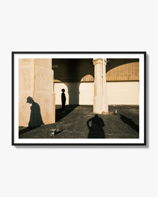 Fine art street photograph of shadows cast on the walls of the Indiana Tea House at Cottesloe Perth Western Australia. Archival pigment print, black frame.