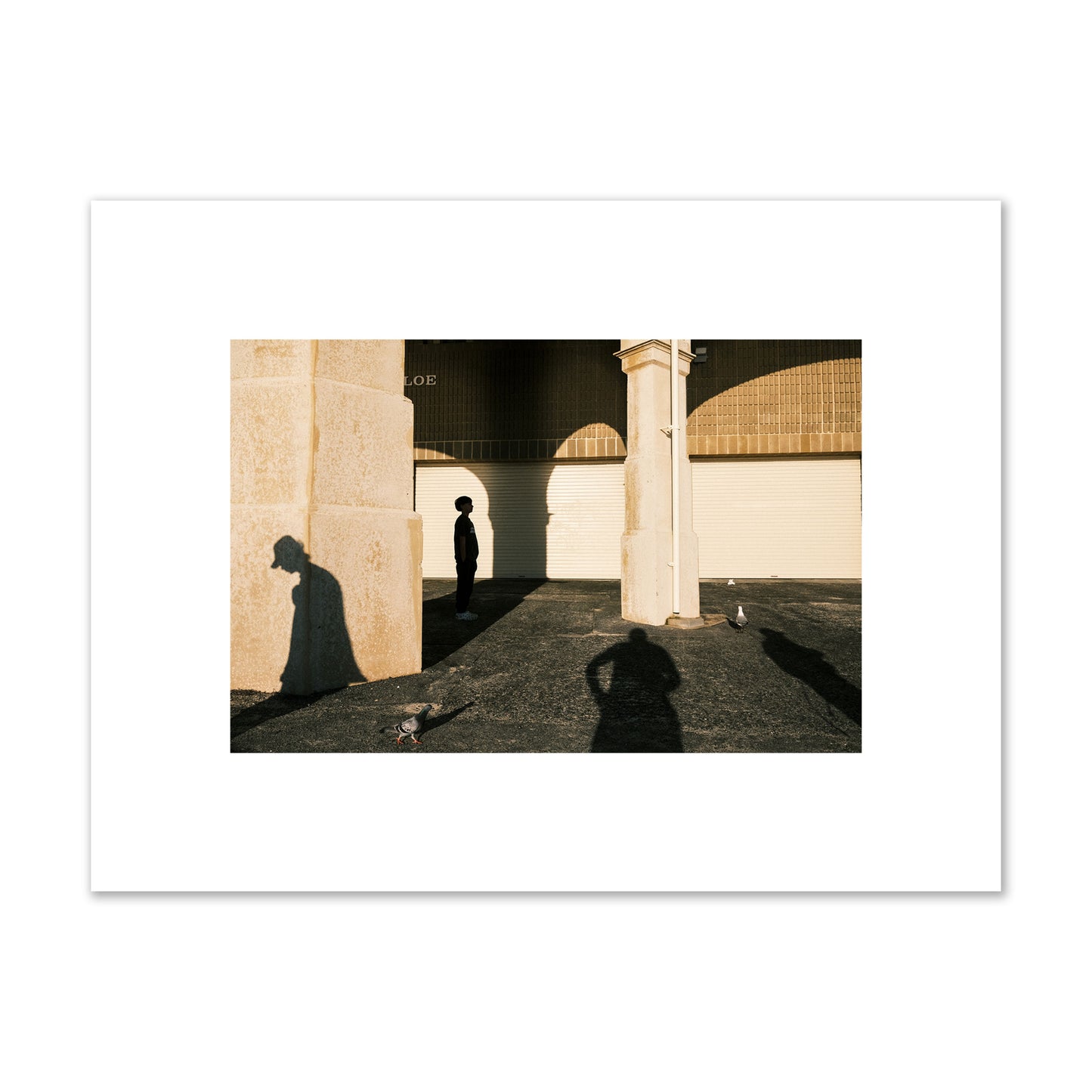 Fine art street photograph of shadows cast on the walls of the Indiana Tea House at Cottesloe Perth Western Australia. Archival pigment print, small size, print.