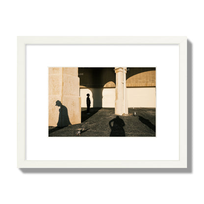 Fine art street photograph of shadows cast on the walls of the Indiana Tea House at Cottesloe Perth Western Australia. Archival pigment print, small size, white frame.