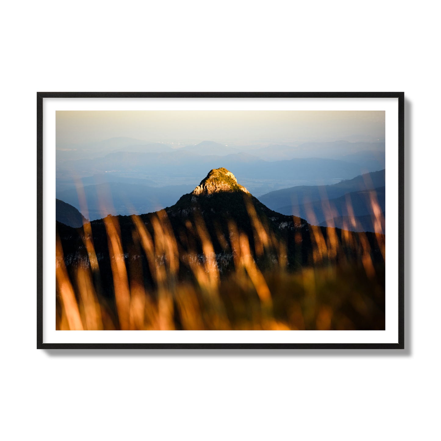 Fine art photo of a mountain peak at sunset. Archival pigment print, collector size, black frame.
