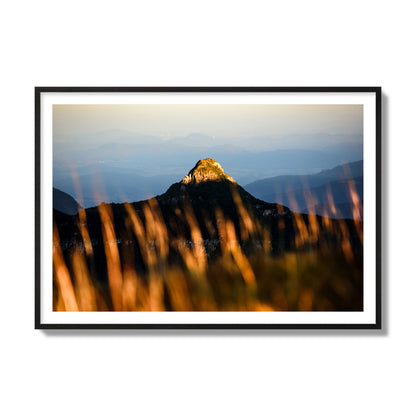 Fine art photo of a mountain peak at sunset. Archival pigment print, collector size, black frame.