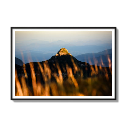 Fine art photo of a mountain peak at sunset. Archival pigment print, gallery size, black frame.