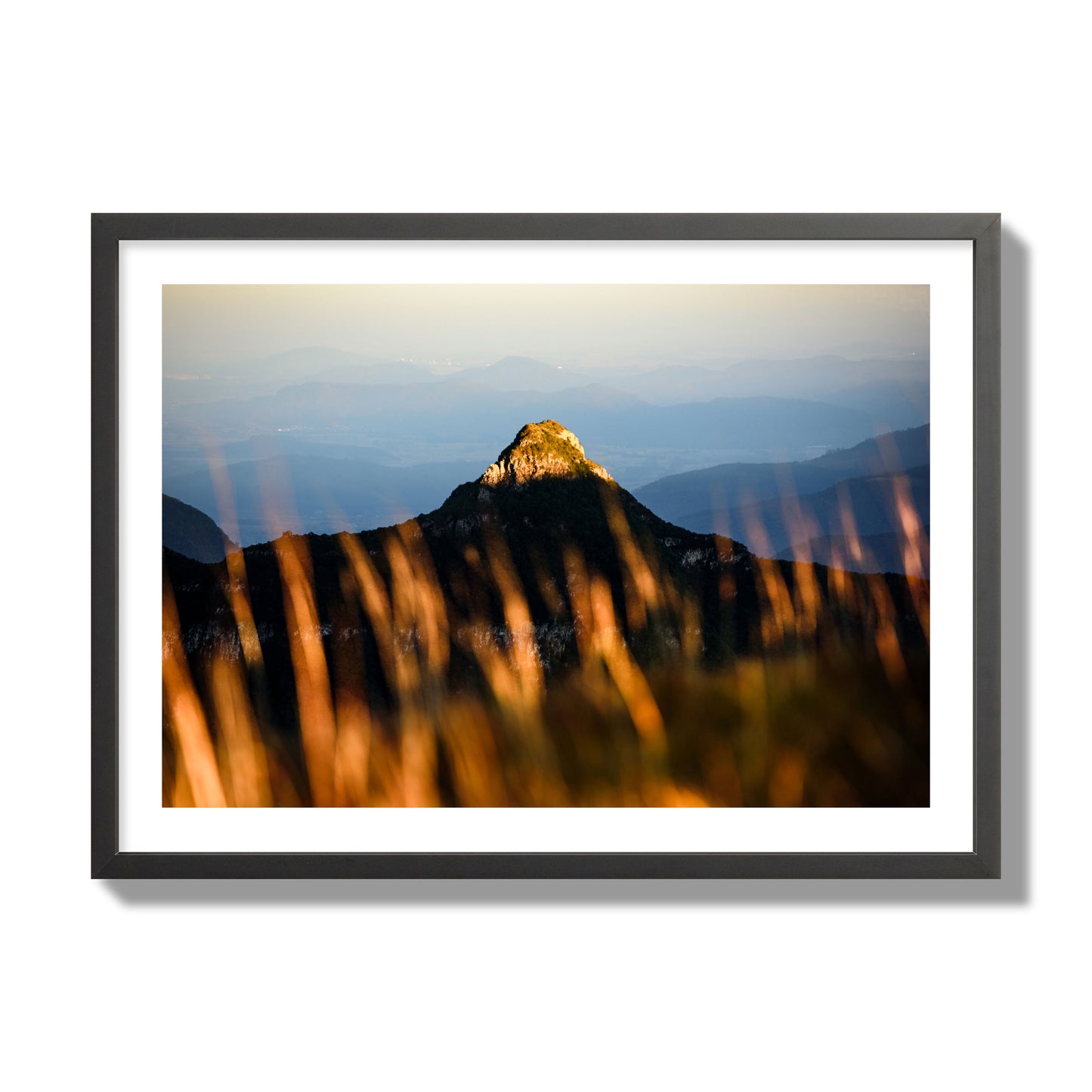 Fine art photo of a mountain peak at sunset. Archival pigment print, giant size, black frame.