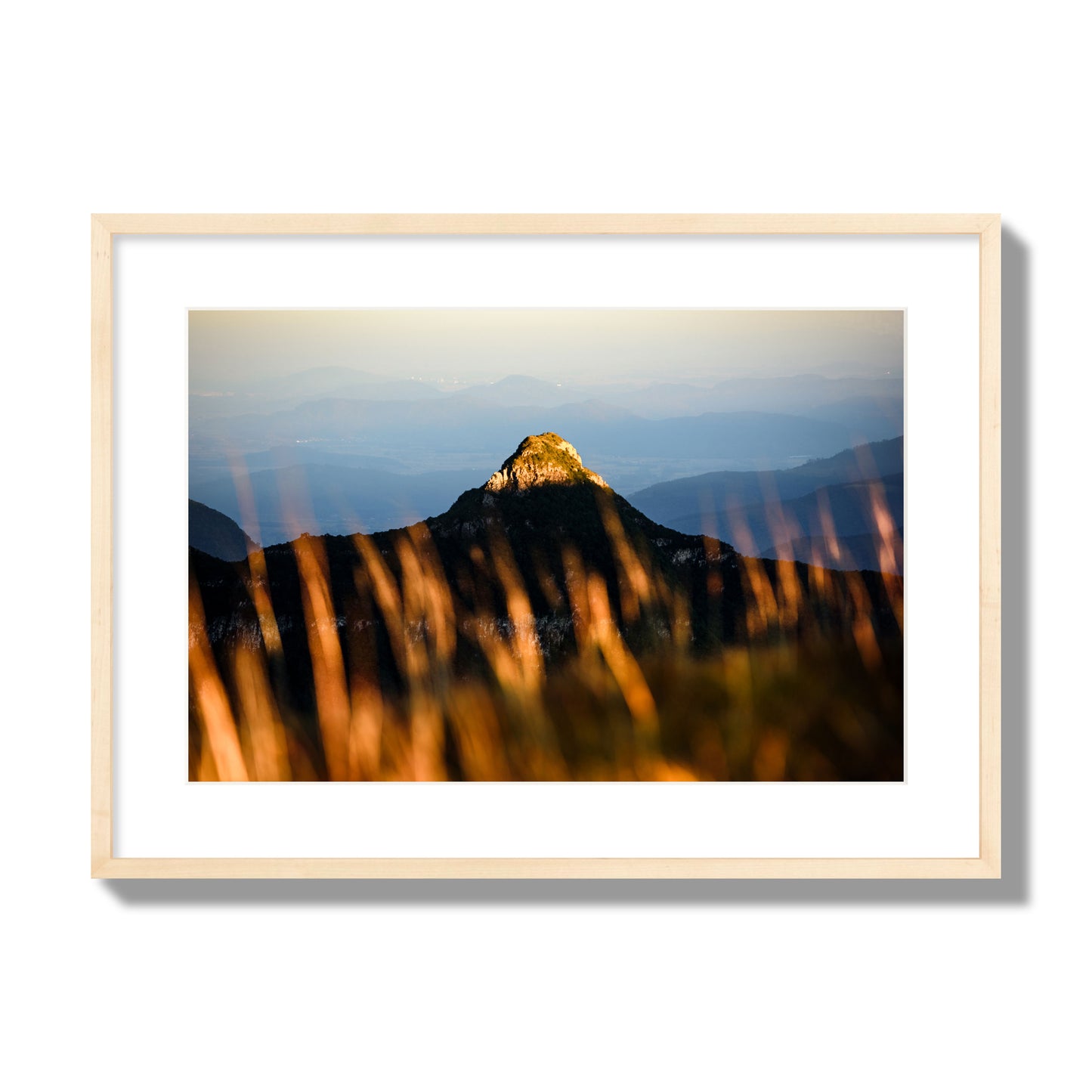 Fine art photo of a mountain peak at sunset. Archival pigment print, large size, natural wood frame.