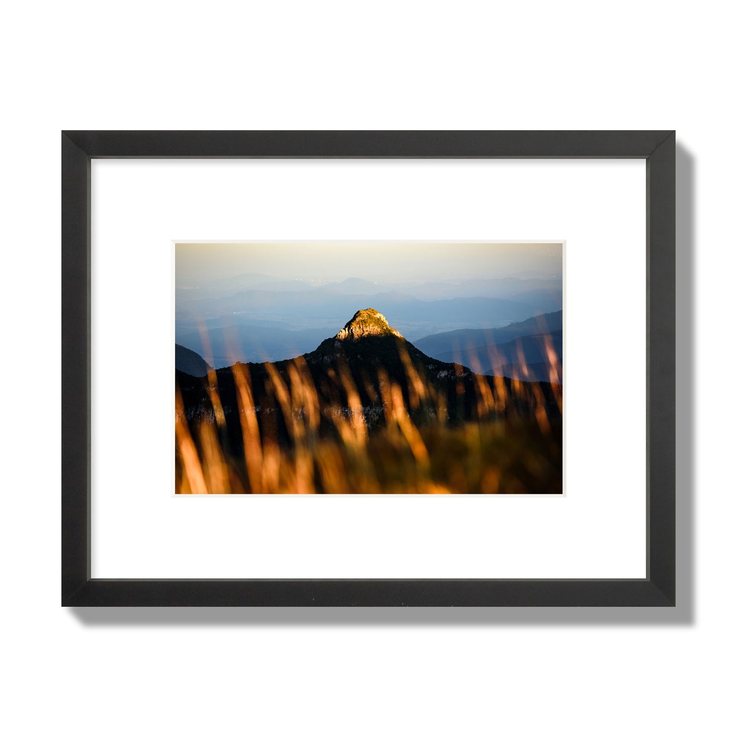 Fine art photo of a mountain peak at sunset. Archival pigment print, small size, black frame.