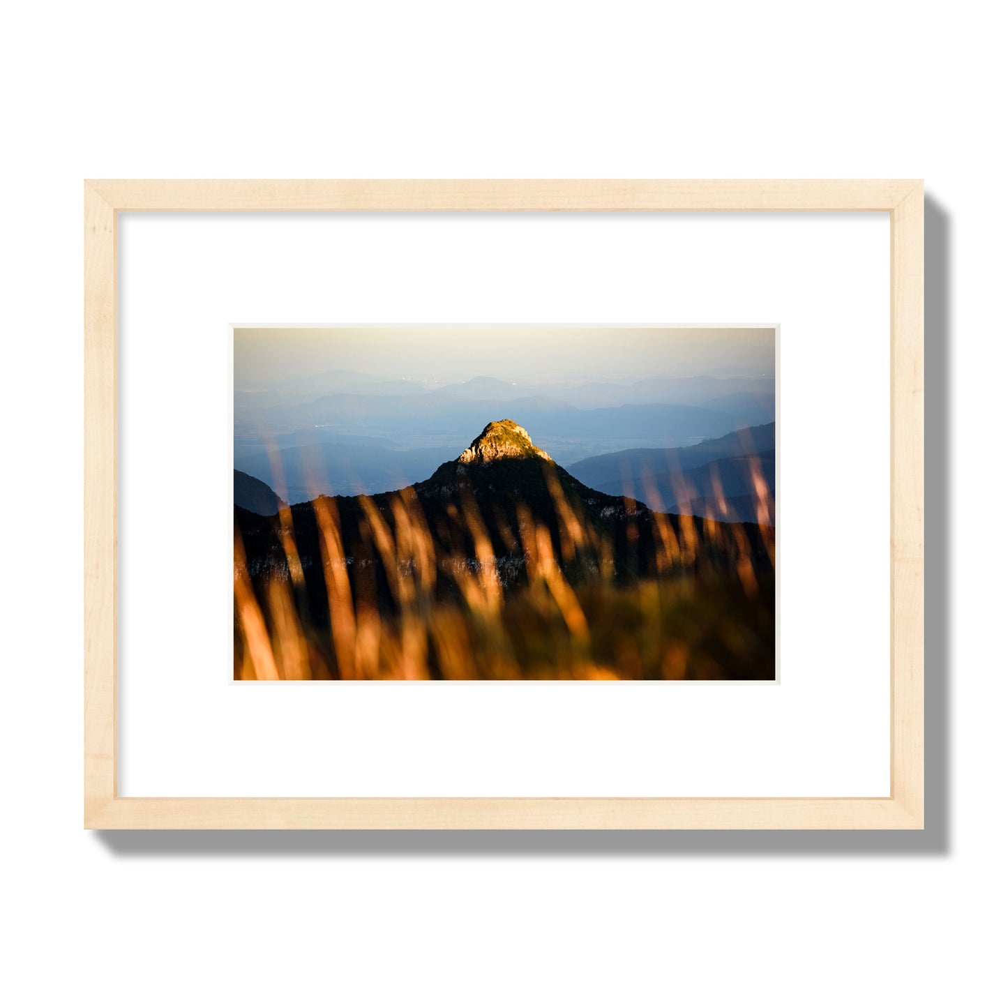 Fine art photo of a mountain peak at sunset. Archival pigment print, small size, natural wood frame.