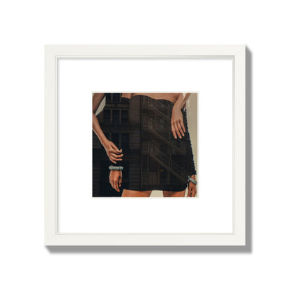 Fine art photograph of two women in black dresses, with the pattern of a fire escape reflected across the fabric, archival pigment print, small size, white frame.